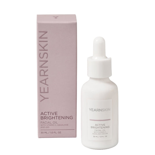 YearnSkin brightening serum for pigmentation and breakout skintypes. Small white bottle